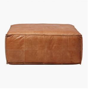 Stitched leather pouf against white background - Moroccan Interior