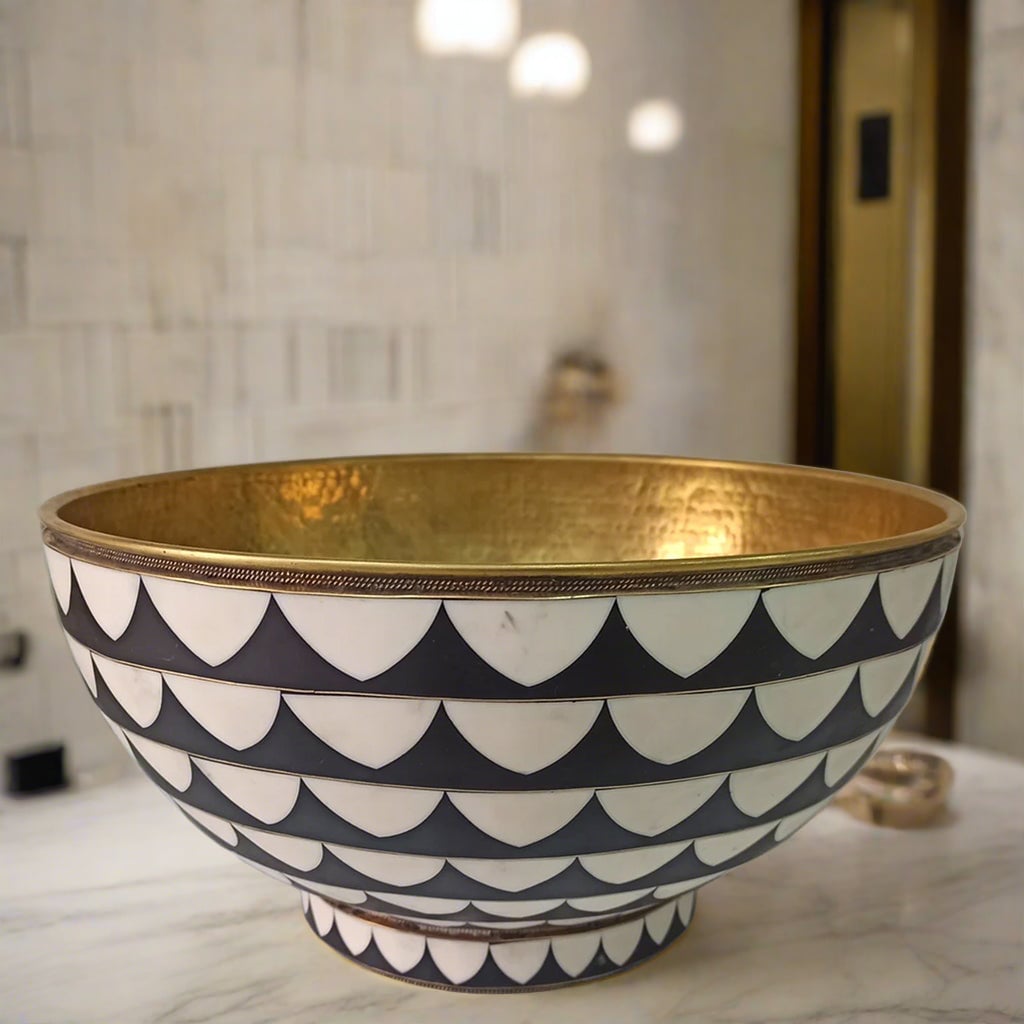 Moroccan Vessel Bathroom Brass Sink over a counter top with white marble background