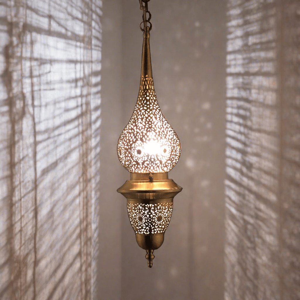 Moroccan brass lamp casting beautiful shadows on the wall 