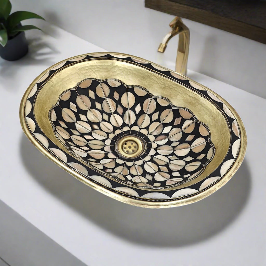 Ornate Brass Bathroom Sink – Handcrafted Oval Design with Intricate Black and Mother-of-Pearl Inlay on Modern White Countertop