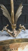 Video showing a gold swan shaped gooseneck brass faucet 