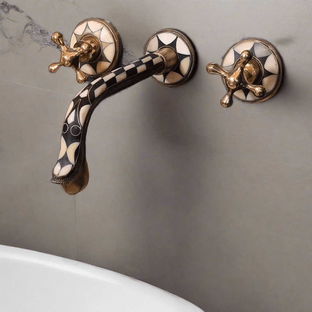 Brass Wall Mount Faucet in a bathroom 