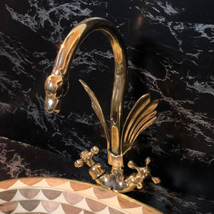 A gold swan shaped gooseneck brass faucet - Moroccan Interior