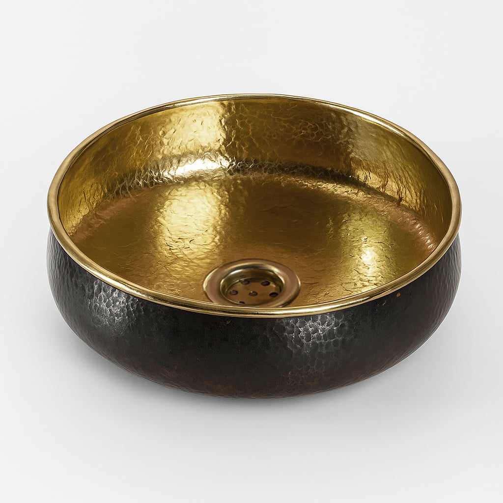  Top view of a round hammered brass bathroom sink with a black exterior and shiny gold interior