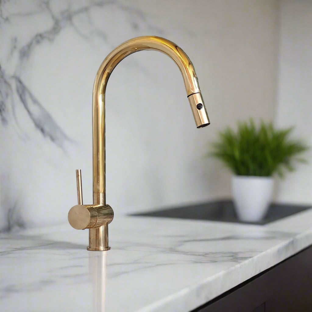 Elegant brass kitchen faucet with a tall curved spout and minimalist lever, ideal for a modern countertop setup