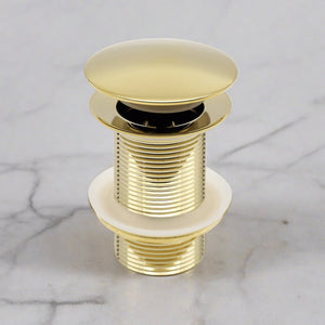 High-quality brass pop-up drain plug designed to complement the handcrafted Moroccan basin, shown on a marble surface