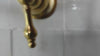 Video demonstration of a wall-mount pot filler faucet in polished against a white tile wall