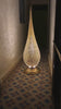 Video featuring a Moroccan brass floor lamp in the entryway of an old house in Marrakesh - Moroccan interior.