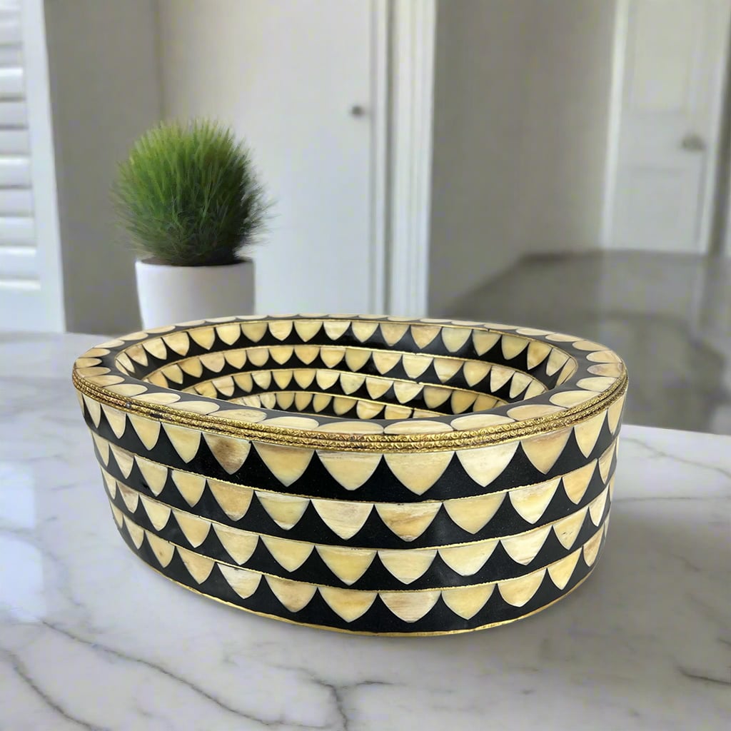 Side view of handmade inlay bathroom sink featuring repeating geometric patterns