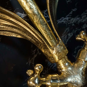 A gold swan shaped gooseneck brass faucet - Moroccan Interior