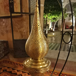 Moroccan Table Brass Lamp hanging in a room of an old riad in Marrakesh Morocco - Moroccan Interior