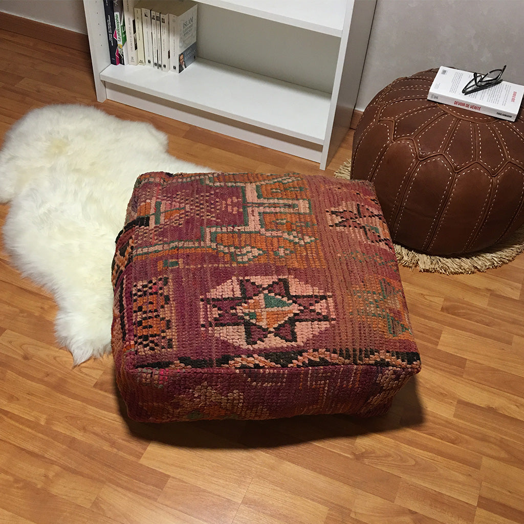 https://moroccaninterior.com/cdn/shop/products/vintage-moroccan-floor-pillow-pouf-purple-front-view_1024x.jpg?v=1623410621